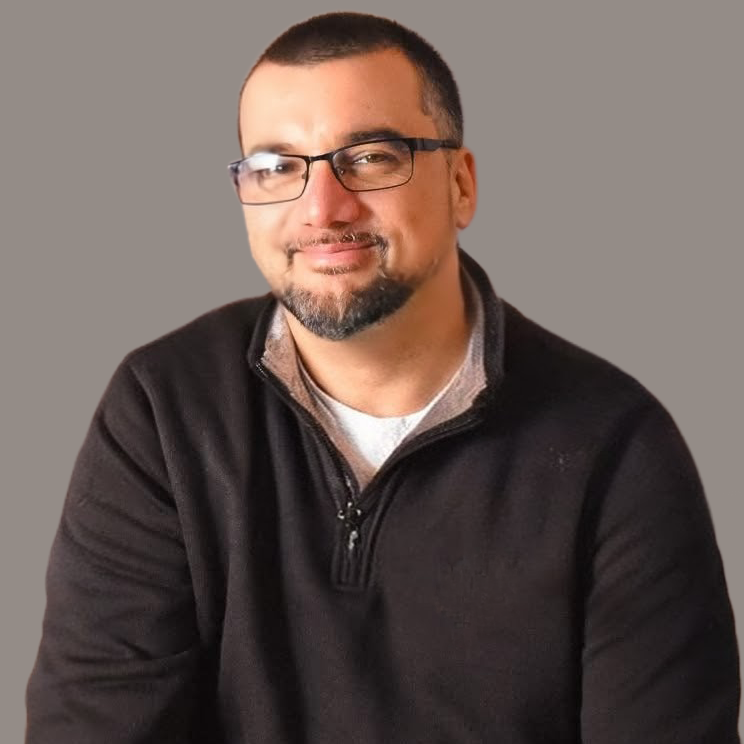 Portrait of a Sales representative speaking with clients in a professional setting, representing lifestyle homes and assisting buyers who build a new house or getting a house built.