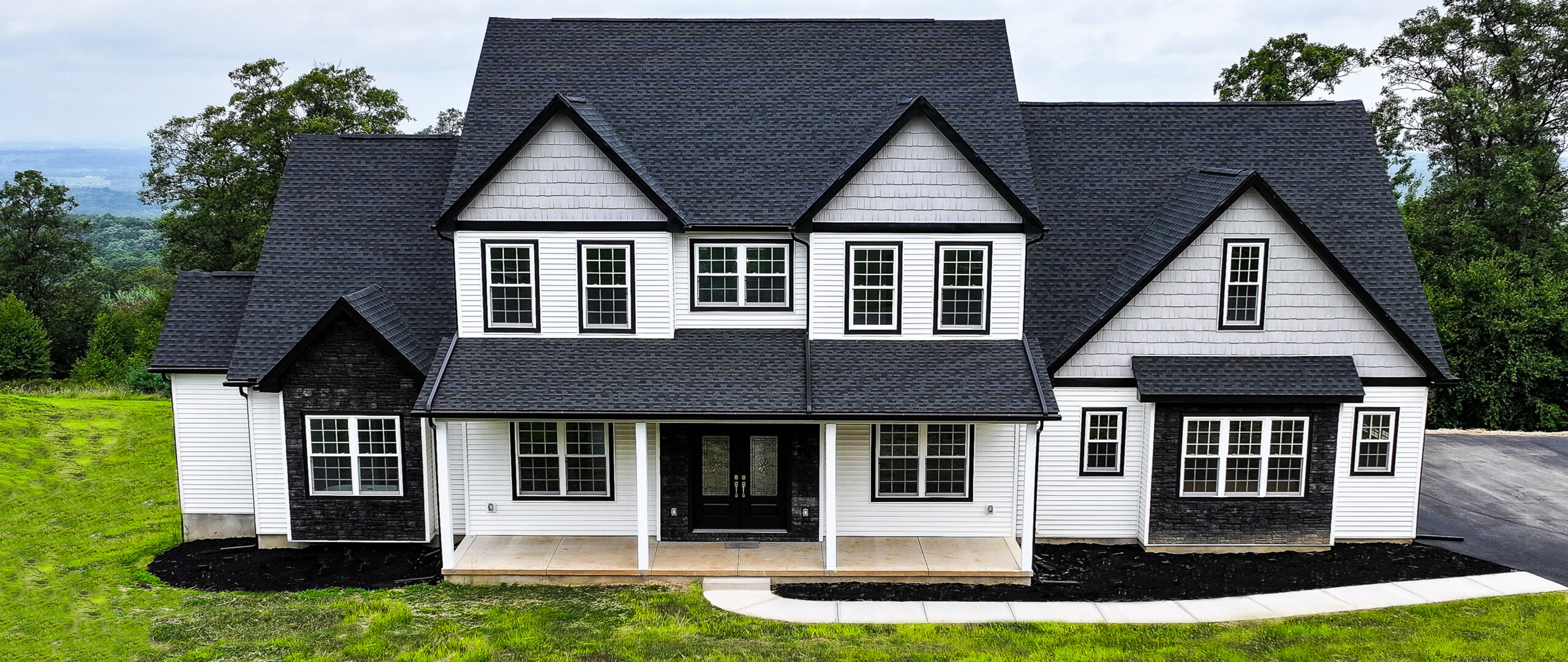 Image of a newly constructed home built by Ridgemark Homes showcasing homes for sale with move in ready homes and prebuilt homes designed for modern living